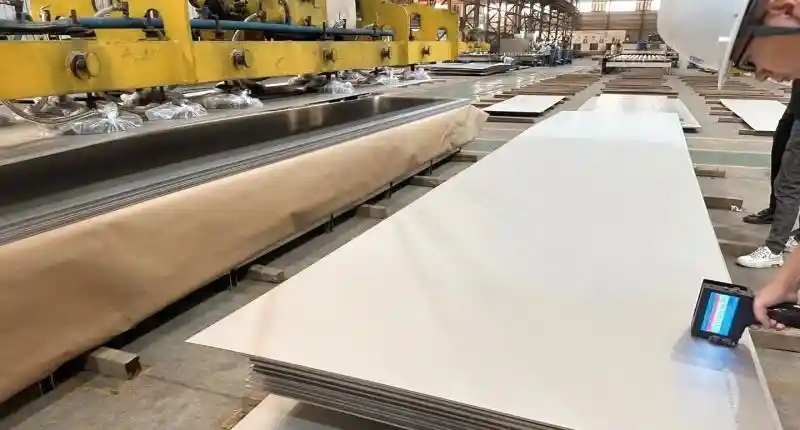 Multi-roll plate leveling for composite materials